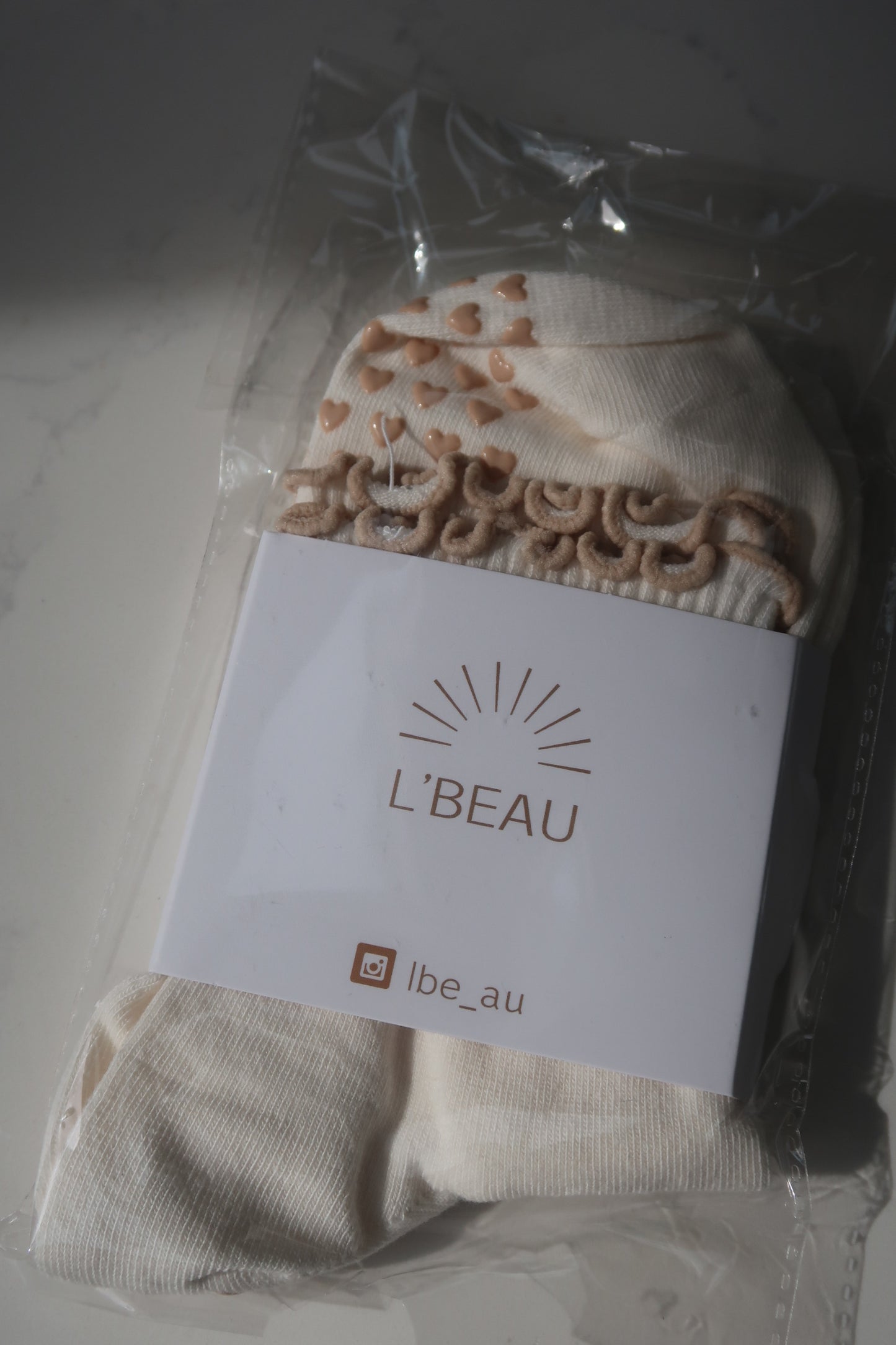 Cream and taupe Heart grip socks