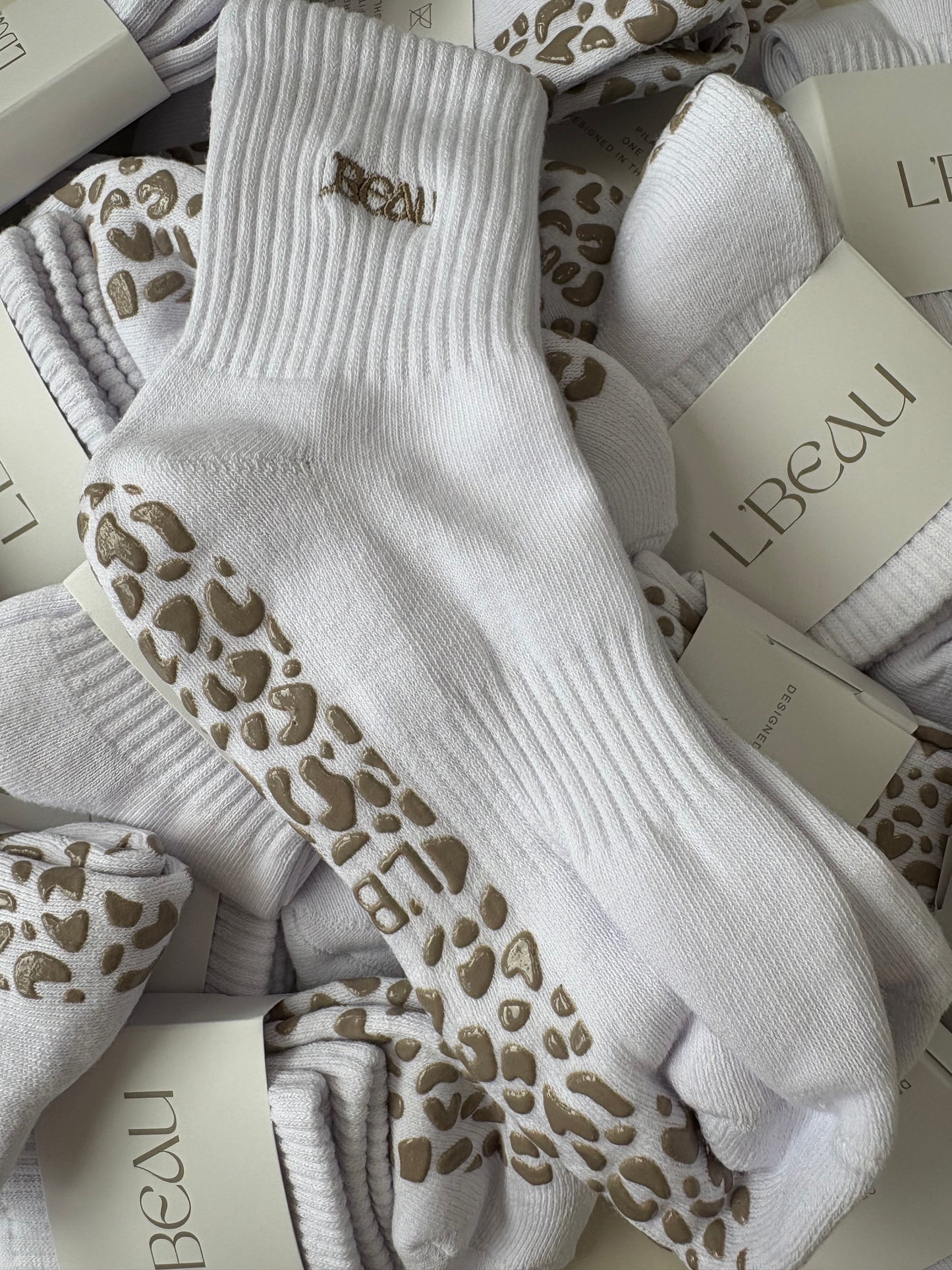 White and Khaki animal print grip socks