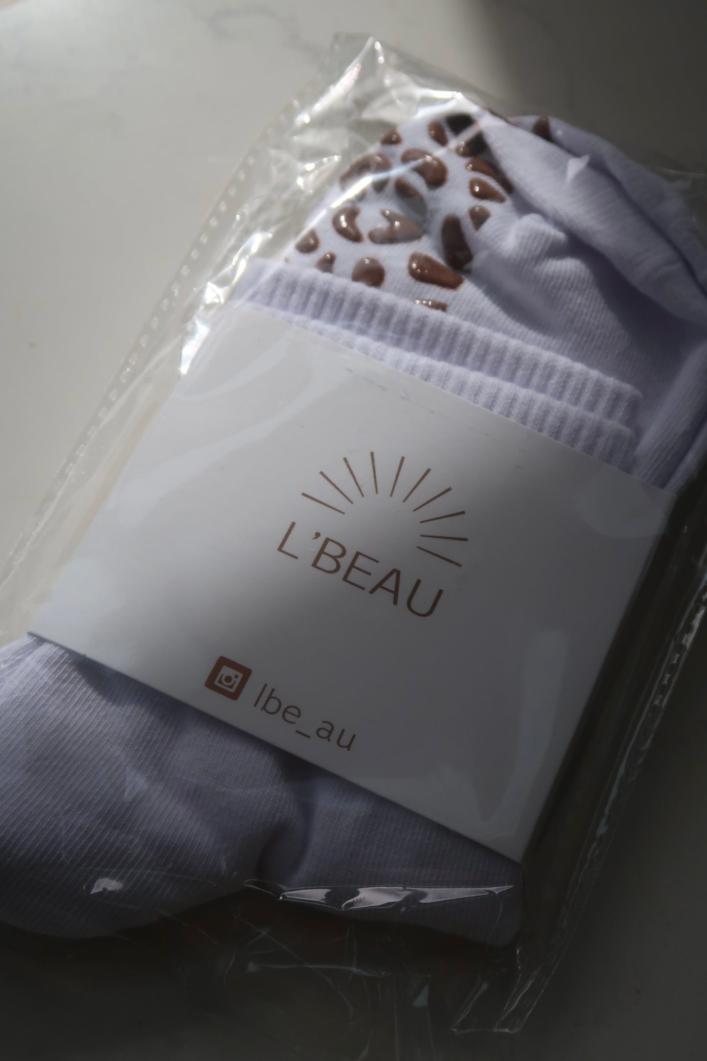 White animal print grip socks