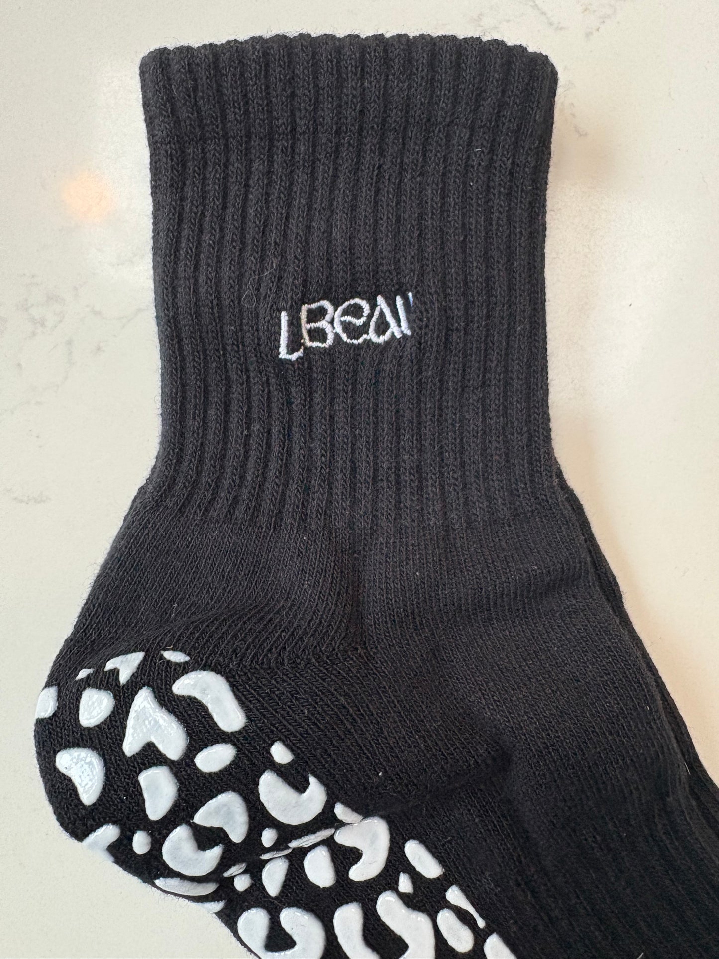 Black animal print grip socks