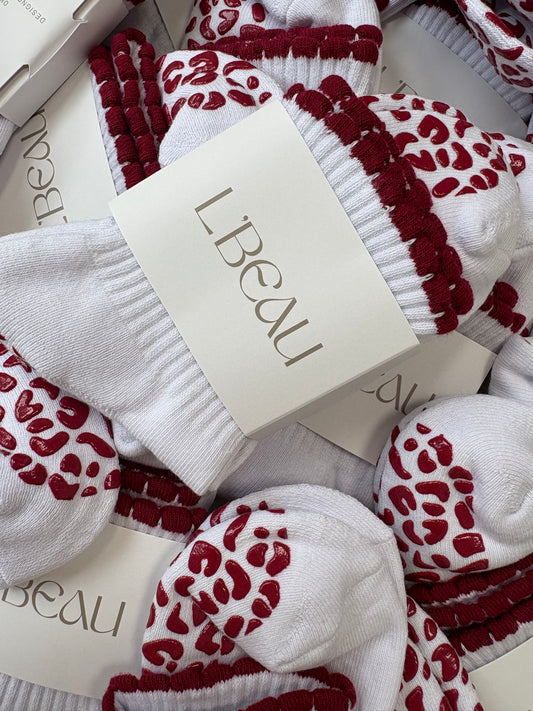 Burgundy animal print grip socks
