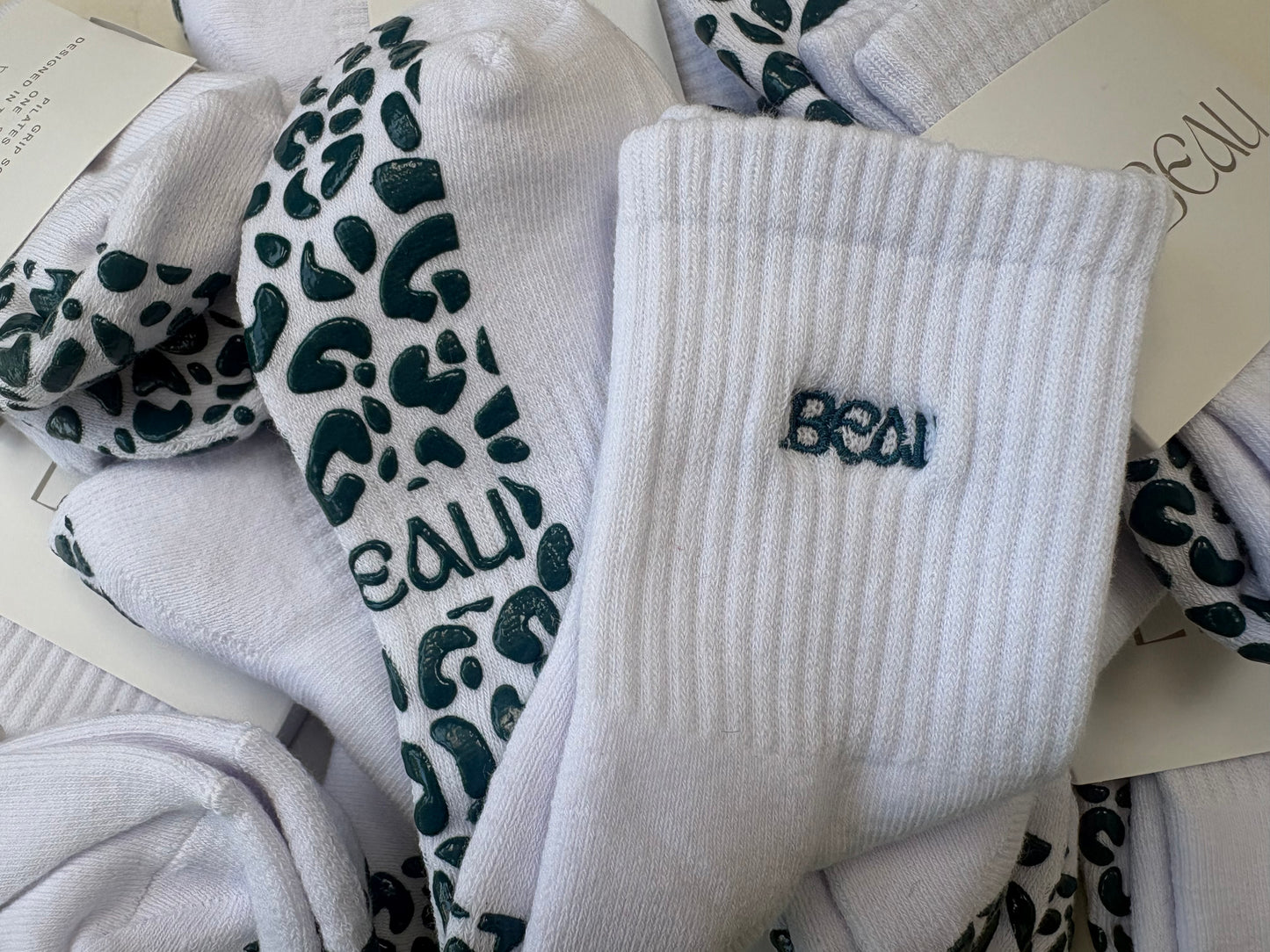 White and Teal animal print grip socks