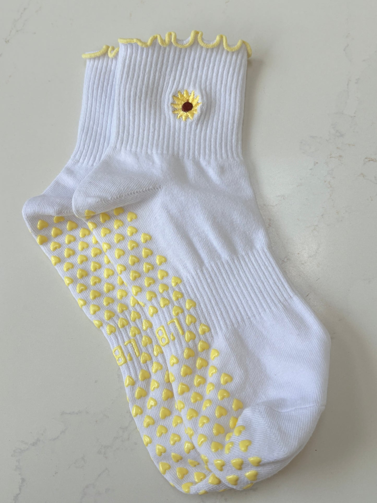 Highland Hospice Yellow and White Heart grip socks