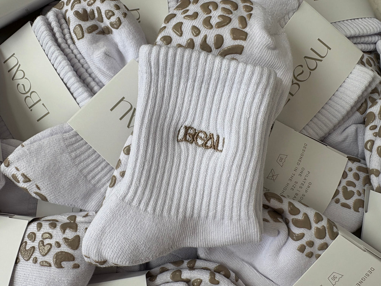 White and Khaki animal print grip socks