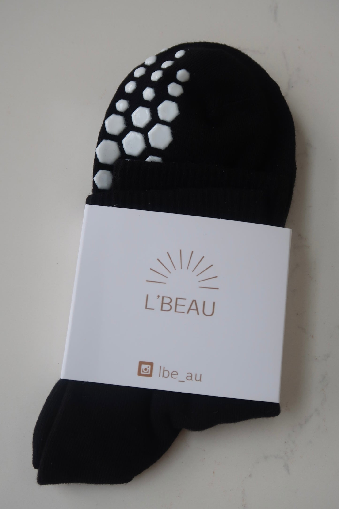 Black hexagon grip socks
