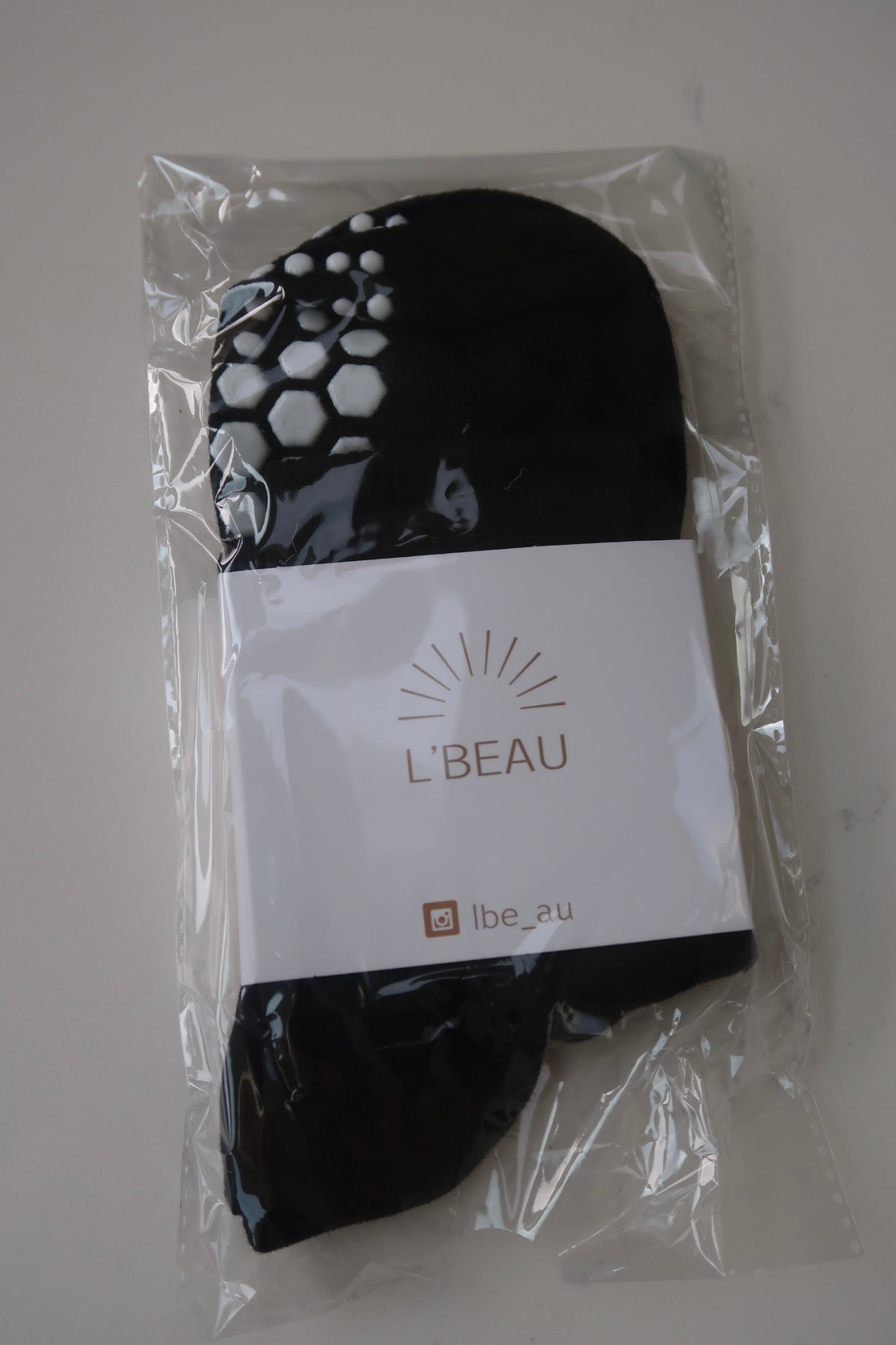 Black hexagon grip socks