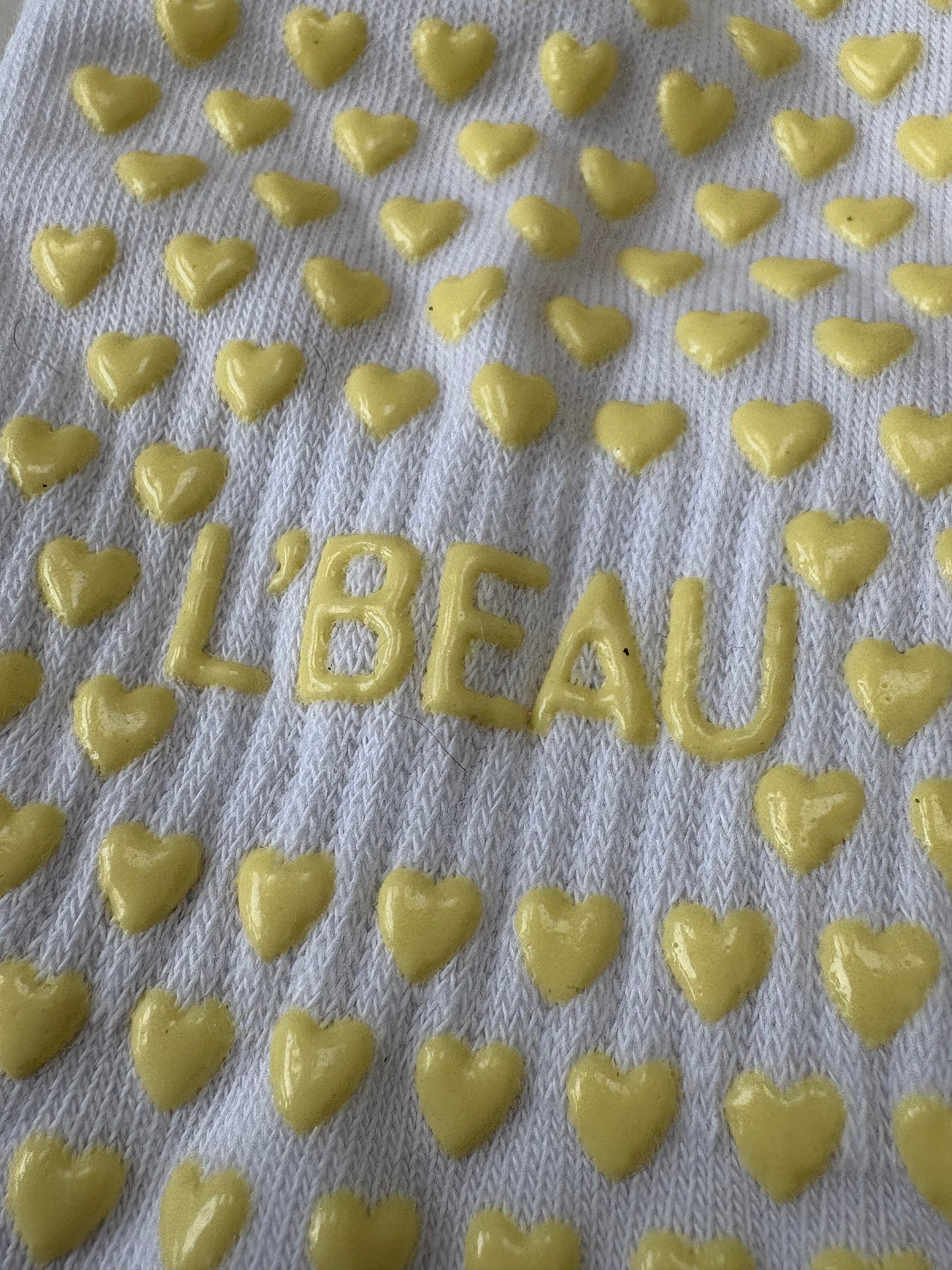 Highland Hospice Yellow and White Heart grip socks