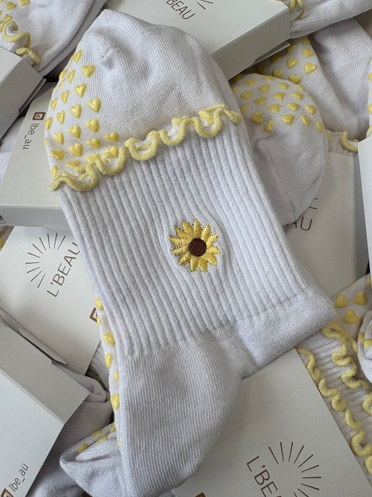 Highland Hospice Yellow and White Heart grip socks
