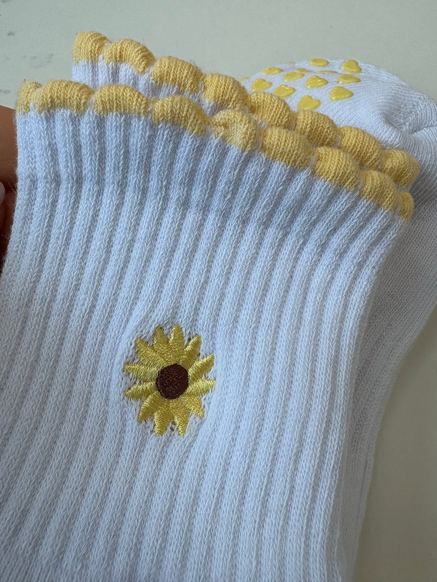 Highland Hospice Yellow and White Heart grip socks
