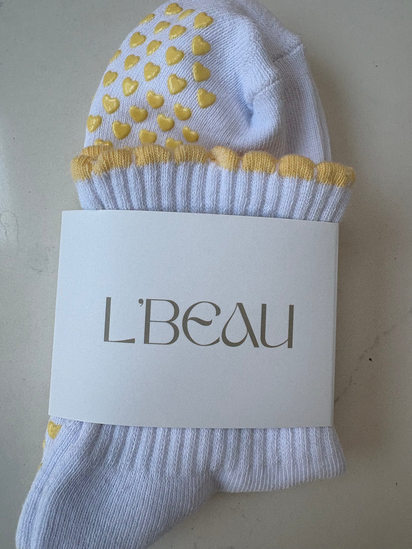 Highland Hospice Yellow and White Heart grip socks